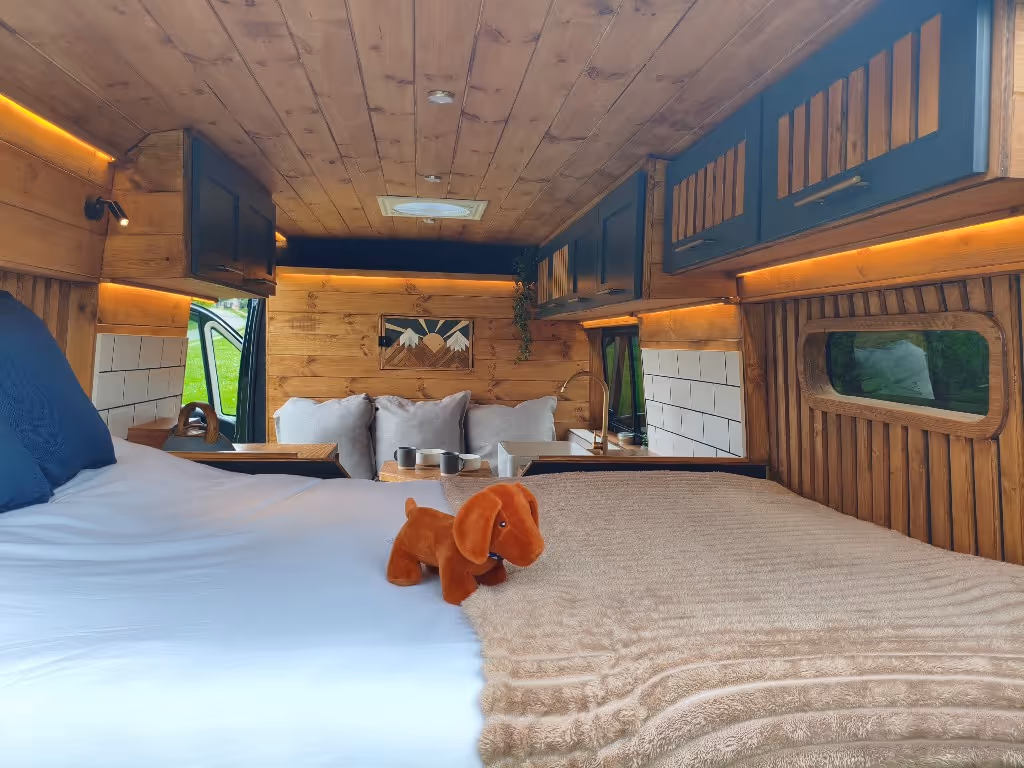 Cosy campervan bed with small dog toy